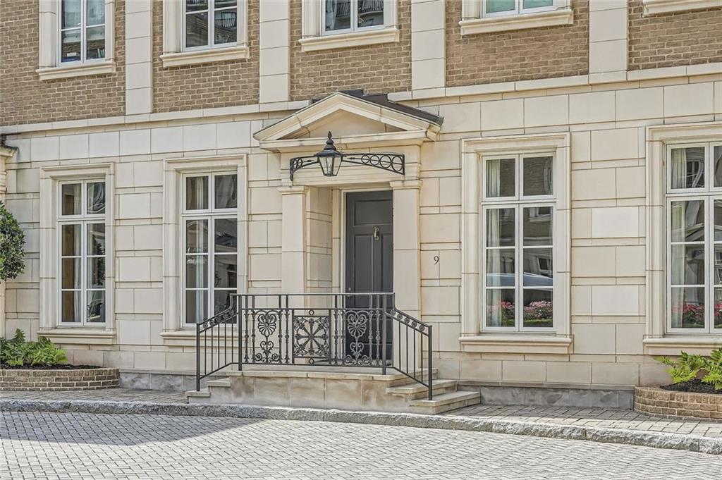 2440 Peachtree Road Northwest, Unit 9 Atlanta, GA 30305 - Photo 2 of 48 a front view of a house