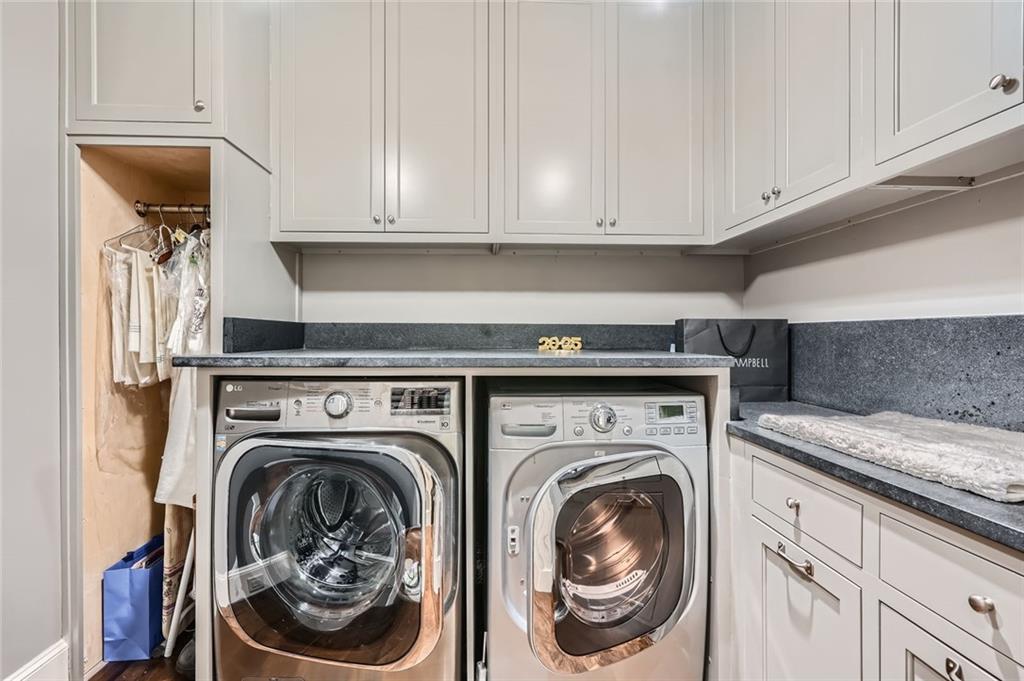 2440 Peachtree Road Northwest, Unit 9 Atlanta, GA 30305 - Photo 30 of 48 a utility room with dryer and washer