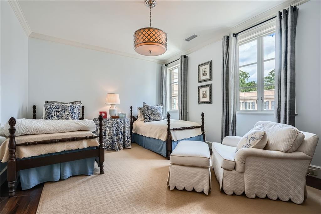 2440 Peachtree Road Northwest, Unit 9 Atlanta, GA 30305 - Photo 38 of 48 a bedroom with furniture and a large window