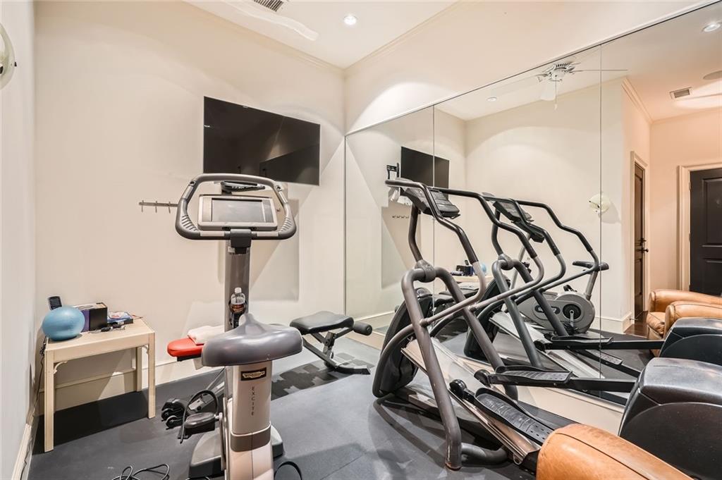 2440 Peachtree Road Northwest, Unit 9 Atlanta, GA 30305 - Photo 40 of 48 a view of a room with gym equipment