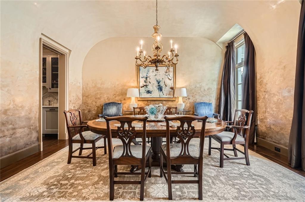 2440 Peachtree Road Northwest, Unit 9 Atlanta, GA 30305 - Photo 6 of 48 a view of a dining room with furniture and window