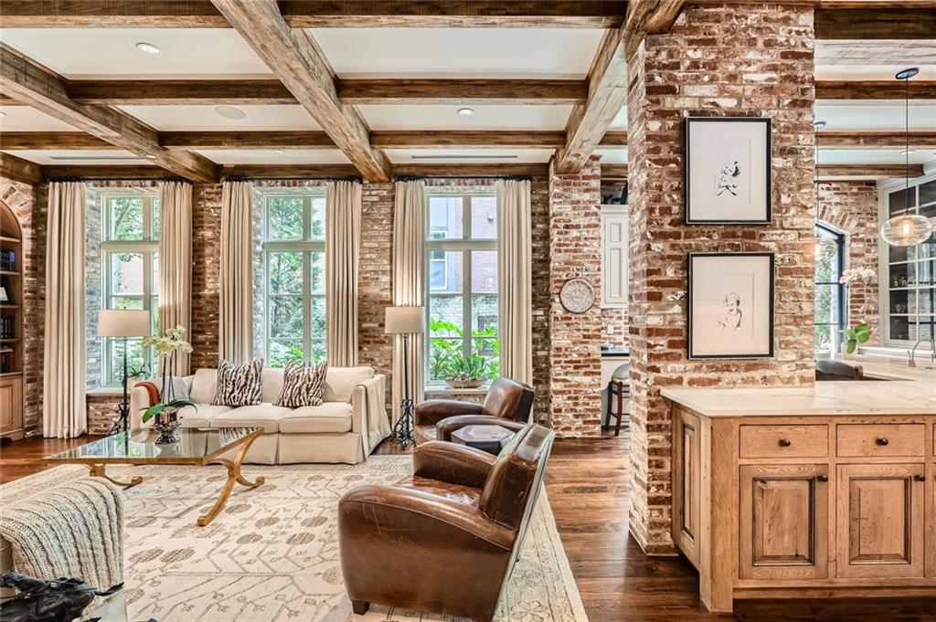 2440 Peachtree Road Northwest, Unit 9 Atlanta, GA 30305 - Photo 9 of 48 a living room with furniture and large windows