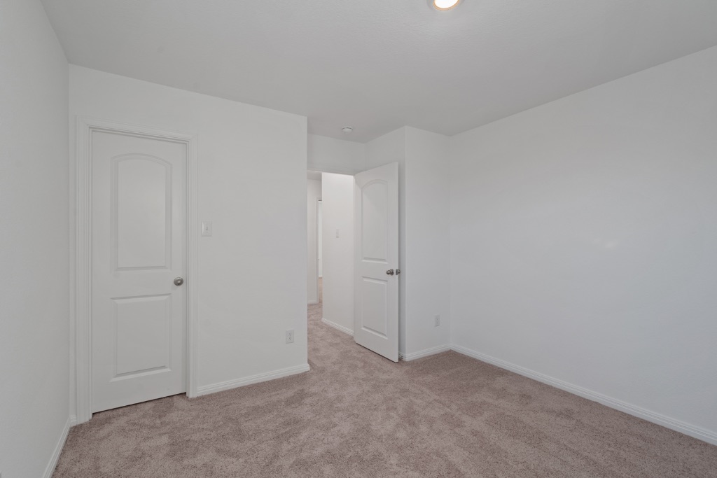 14013 John Aregood Pass Elgin, TX 78621 - Photo 20 of 31 a view of an empty room