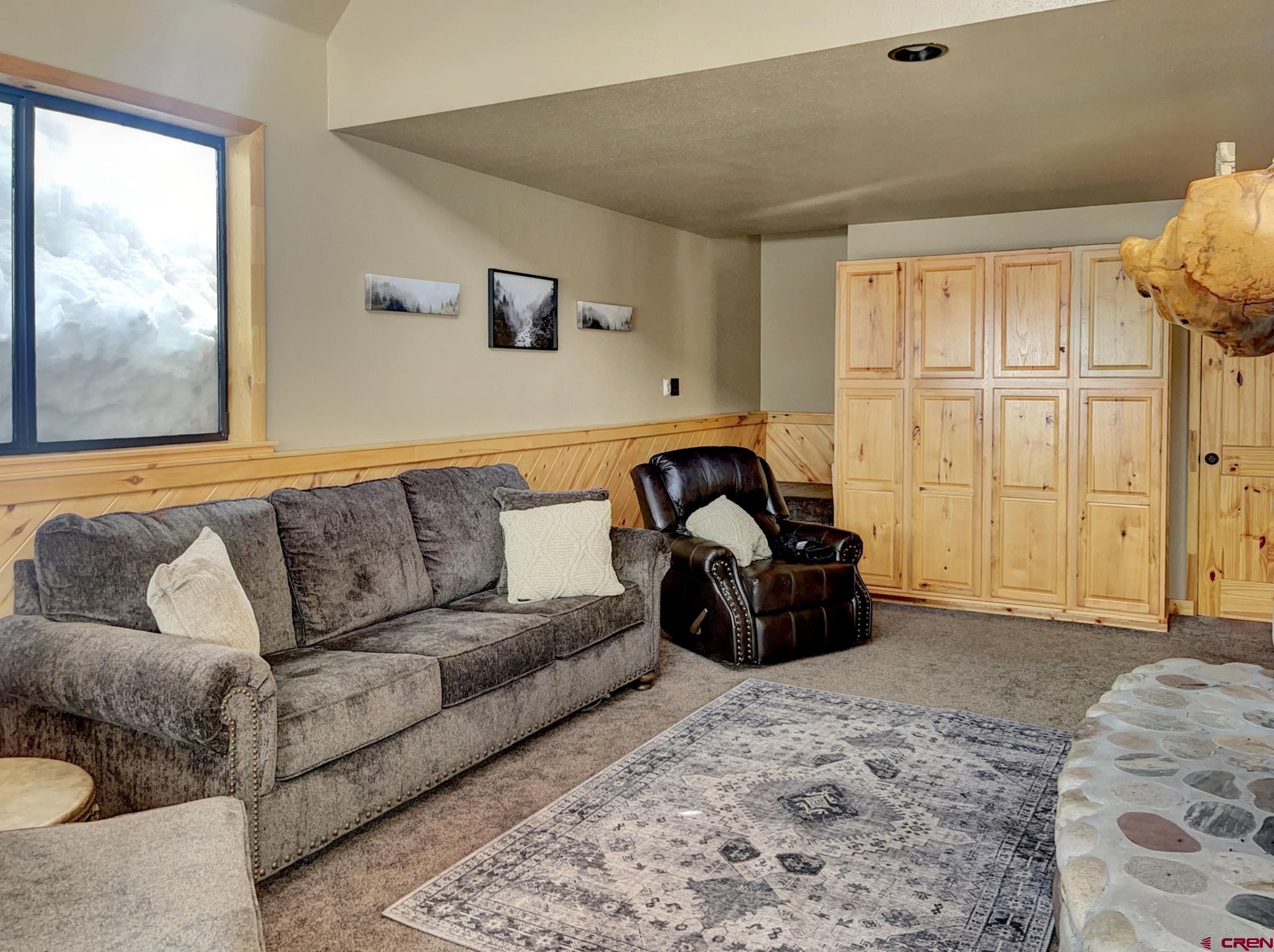 Lot 1 Aspen Hills Road Cedaredge, CO 81413 - Photo 16 of 32 a living room with furniture a couch and a window