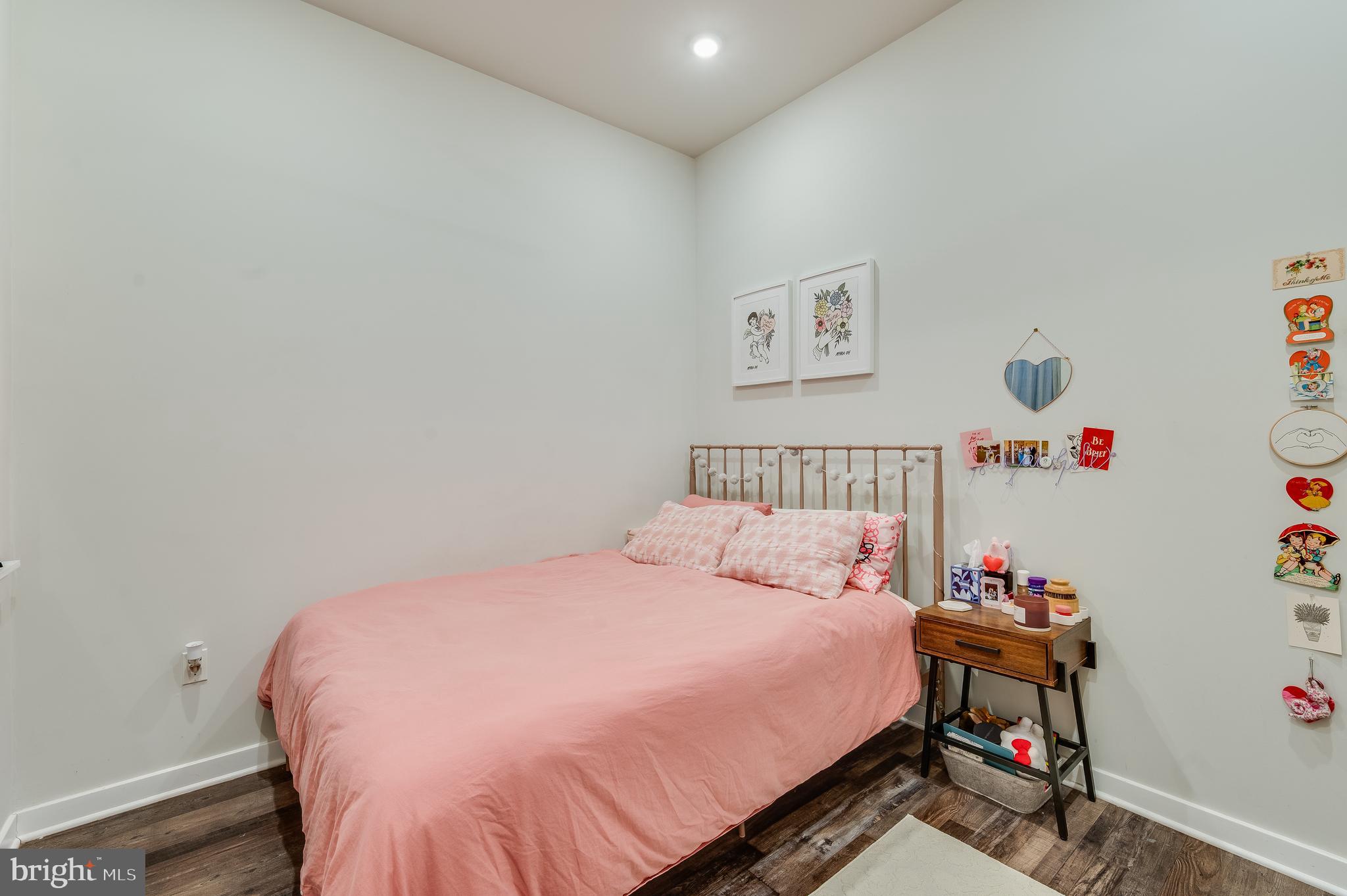 3708 Haverford Avenue, Unit 1 Philadelphia, PA 19104 - Photo 11 of 20 a bedroom with a bed and a wooden floor