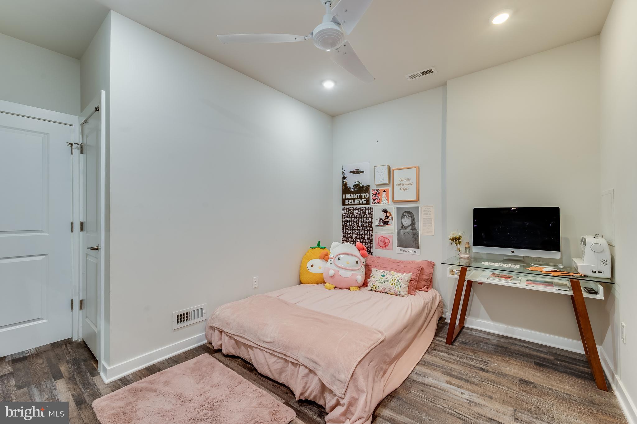 3708 Haverford Avenue, Unit 1 Philadelphia, PA 19104 - Photo 14 of 20 a bedroom with a bed and a flat screen tv