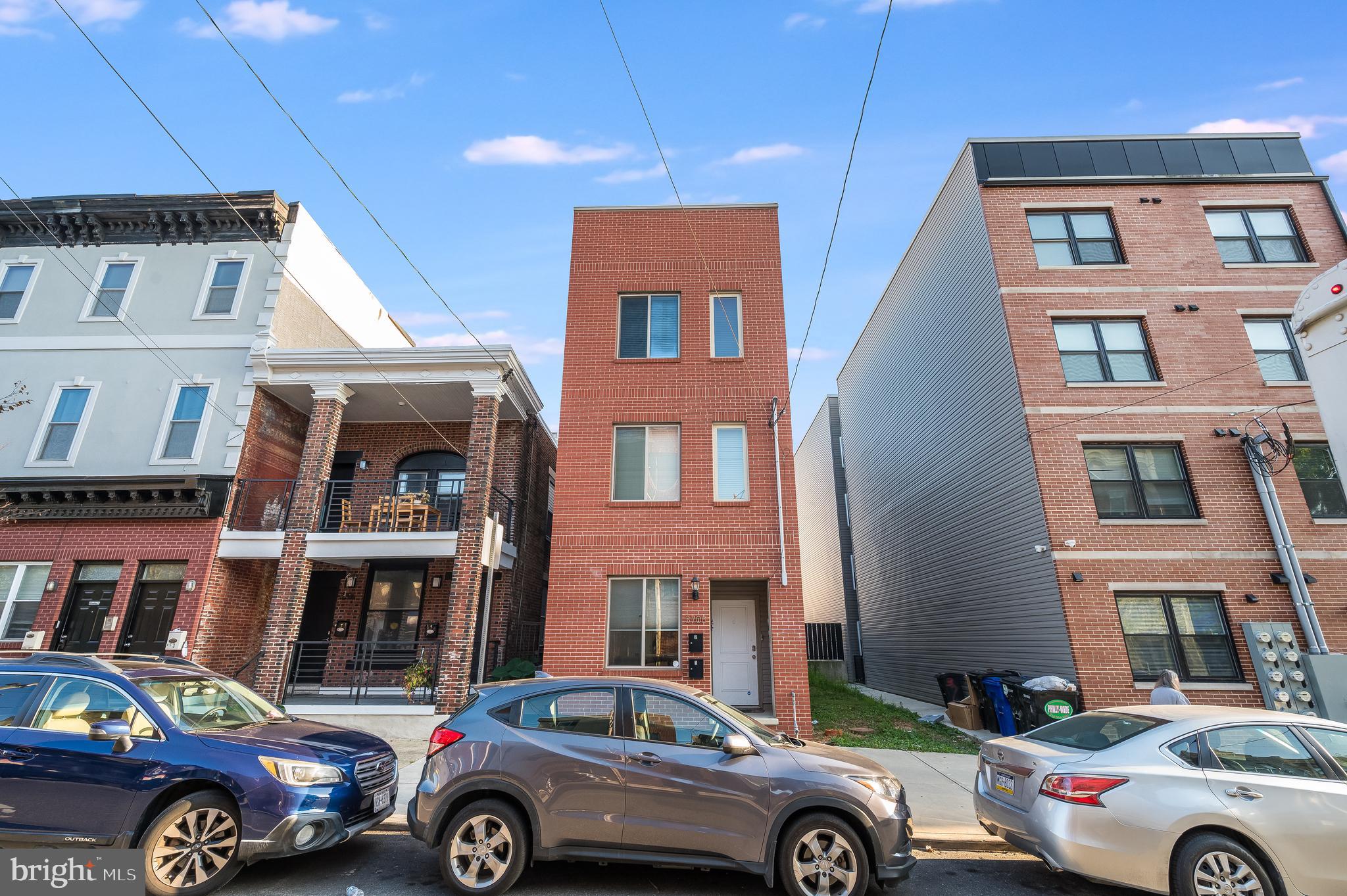 3708 Haverford Avenue, Unit 1 Philadelphia, PA 19104 - Photo 17 of 20 a front view of a residential apartment building with a parking space