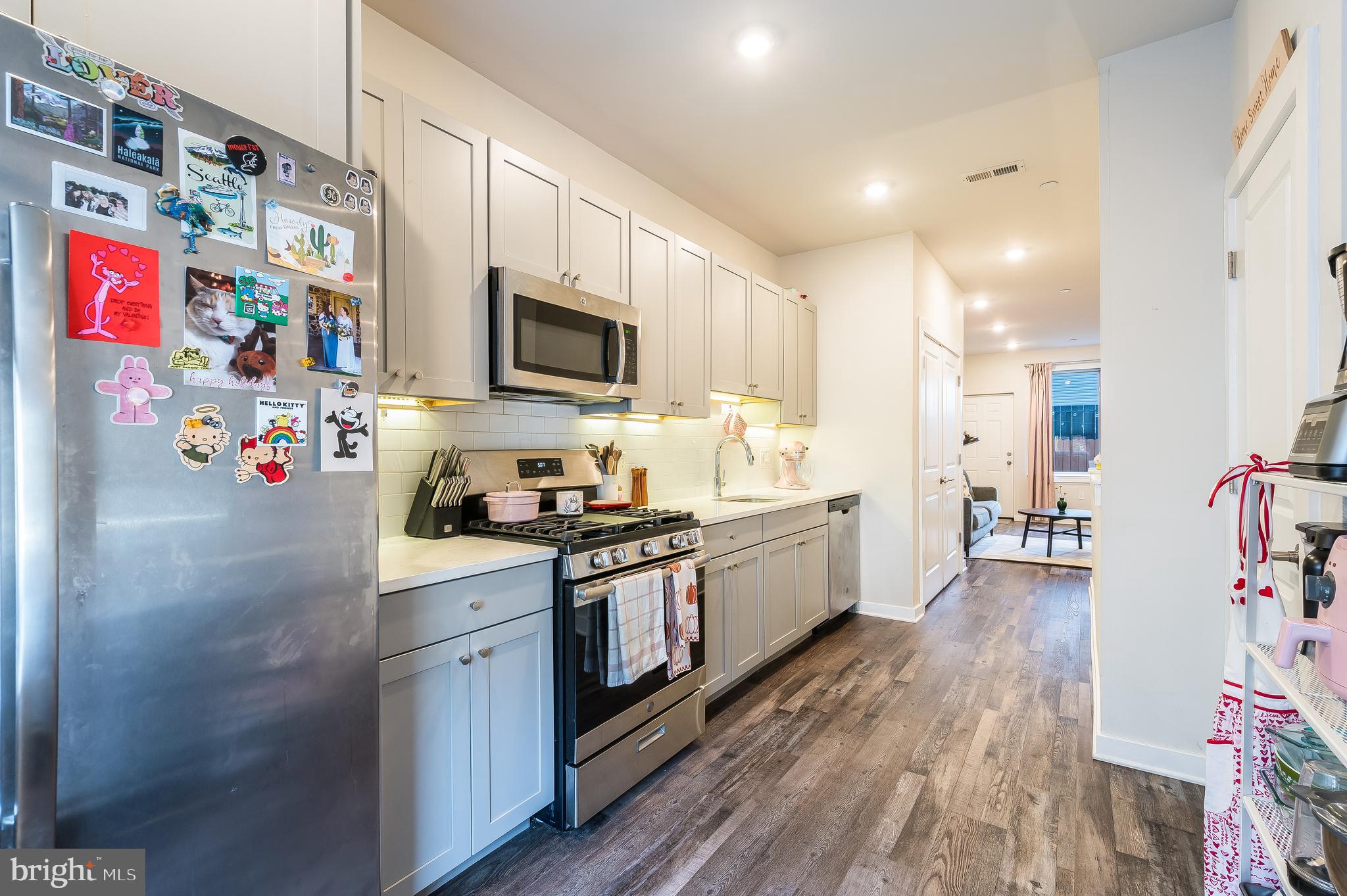 3708 Haverford Avenue, Unit 1 Philadelphia, PA 19104 - Photo 2 of 20 a large kitchen with stainless steel appliances granite countertop a lot of counter top space and cabinets