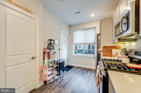 a room with furniture and a wooden floor