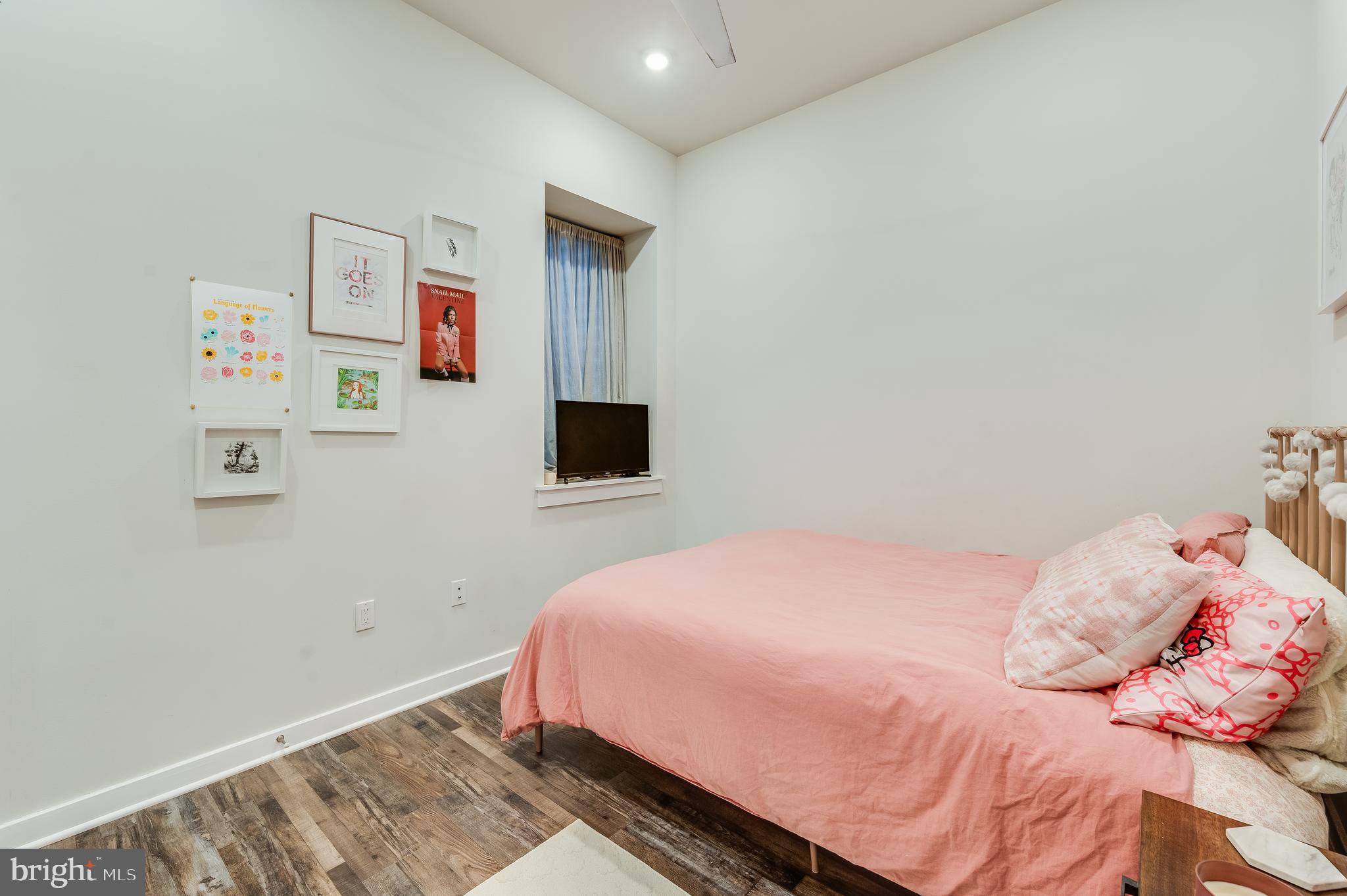 3708 Haverford Avenue, Unit 1 Philadelphia, PA 19104 - Photo 10 of 20 a bedroom with a bed and a white wall