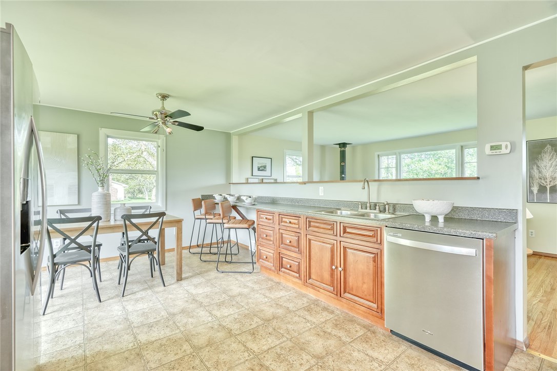 1815 Woodard Road Webster, NY 14580 - Photo 12 of 45 LIGHT & BRIGHT EAT-IN KITCHEN . . BREAKFAST BAR