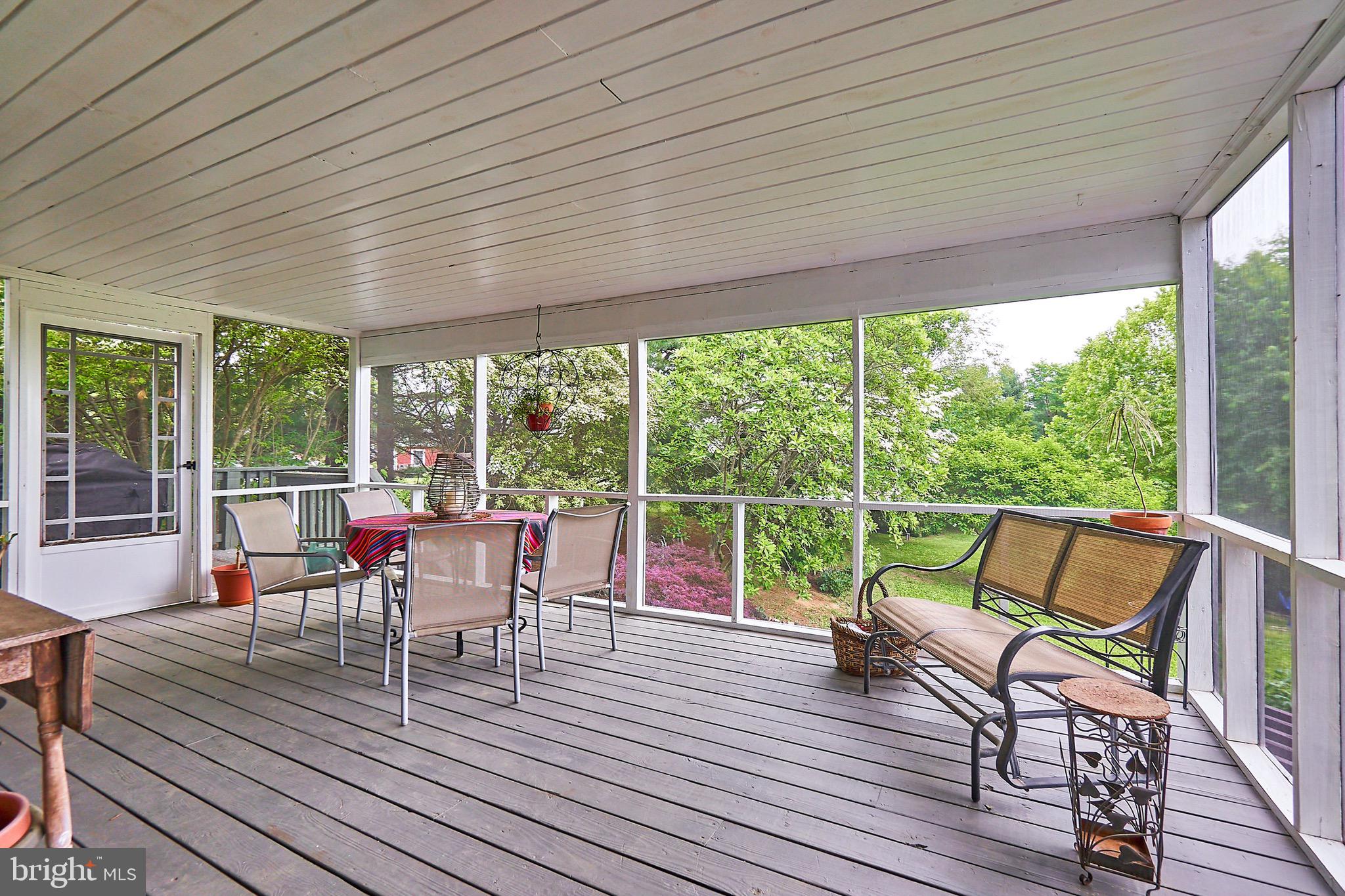 36716 North Fork Road Purcellville, VA 20132 - Photo 18 of 78 Screened Porch leads to Grilling Deck & steps down