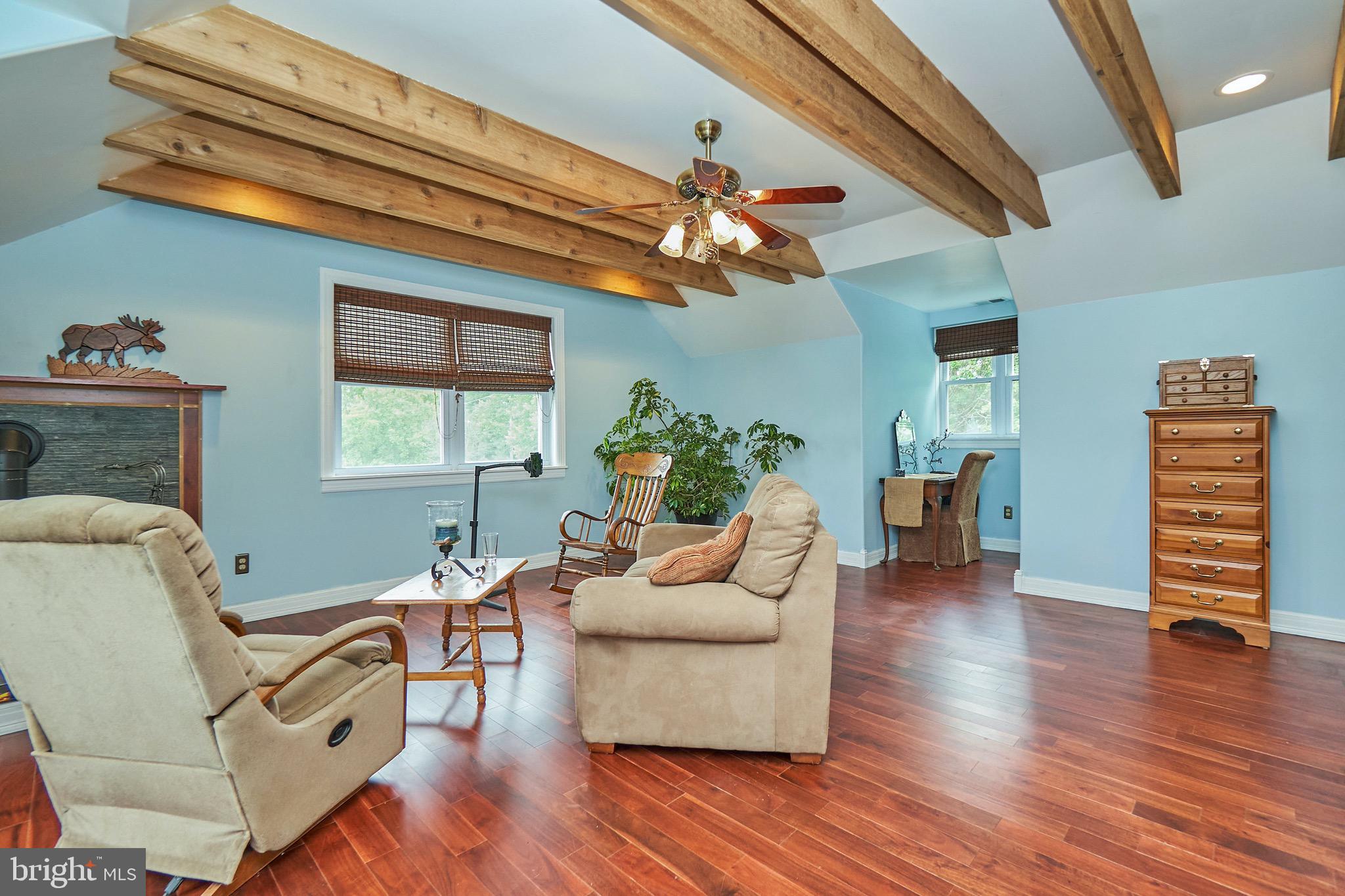 36716 North Fork Road Purcellville, VA 20132 - Photo 35 of 78 Hardwood Flooring and Corner Propane Fireplace