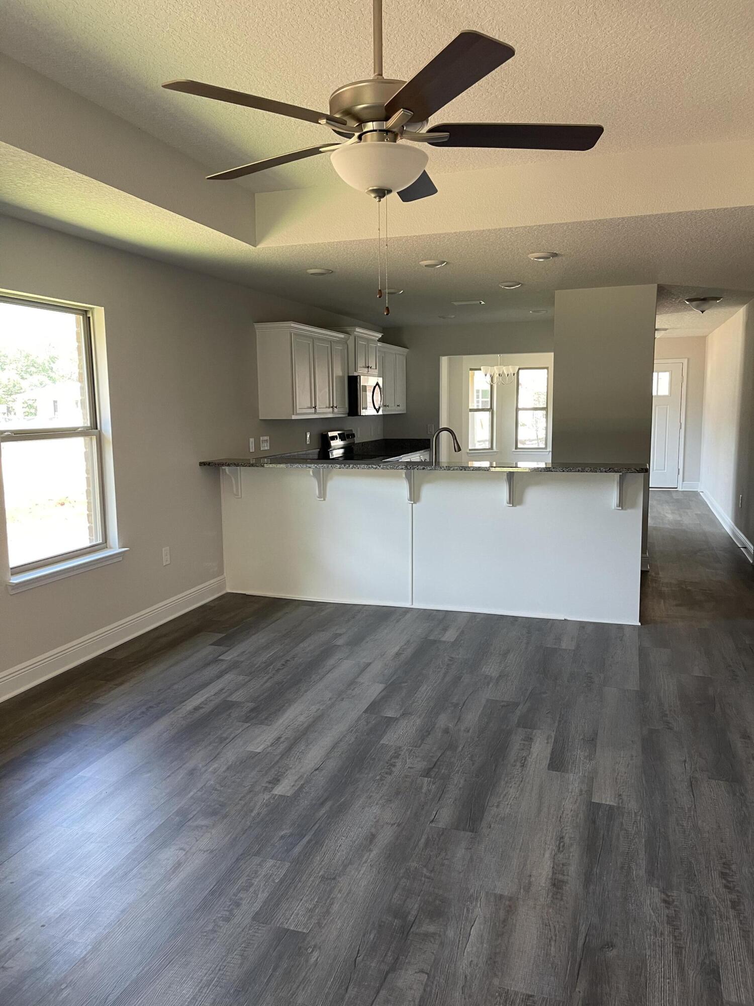 106 Ridgeway Circle Crestview, FL 32536 - Photo 11 of 25 a view of a kitchen with a sink and a window
