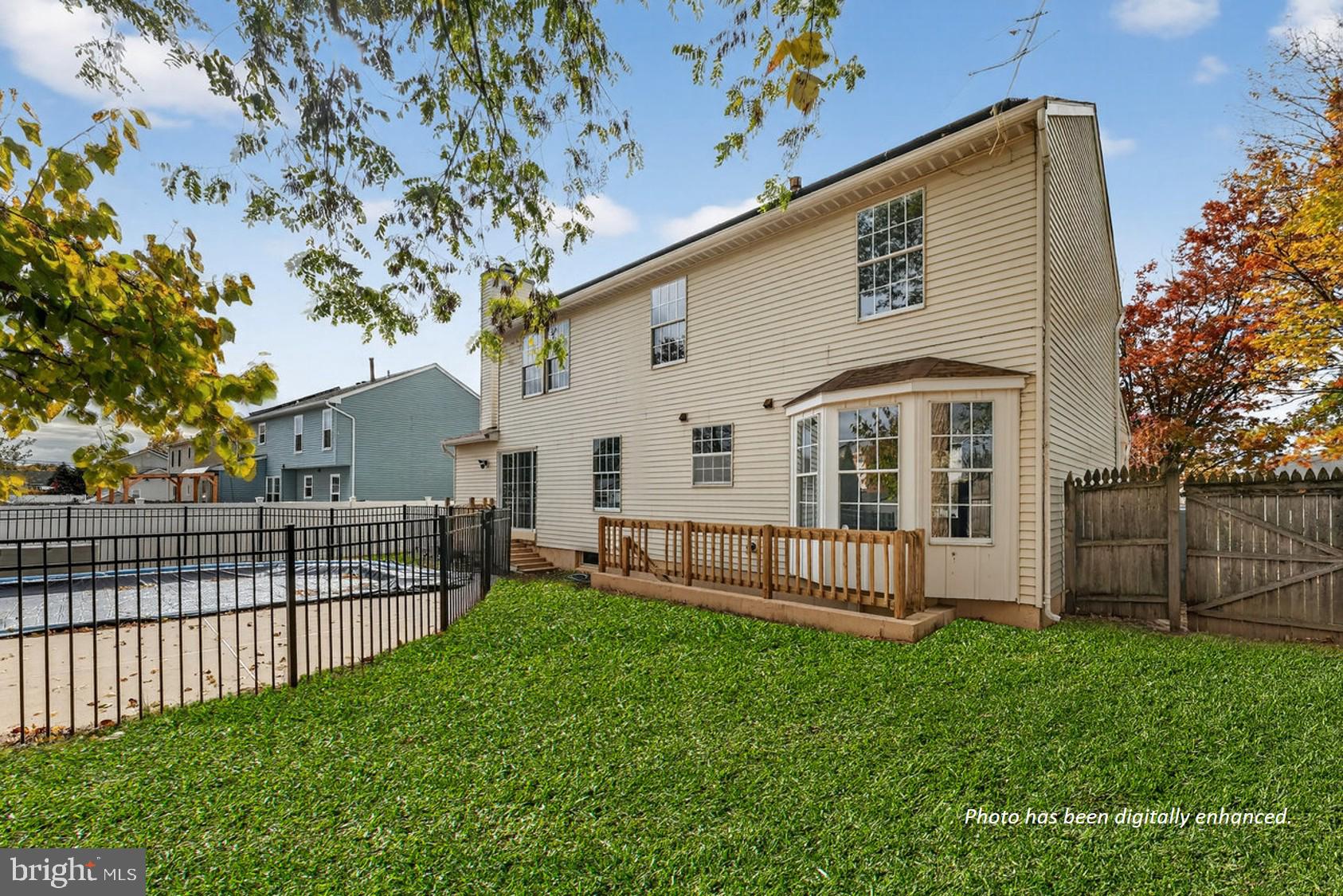 212 Chinnick Avenue Hamilton, NJ 08619 - Photo 16 of 17 a view of a house with a yard and sitting area
