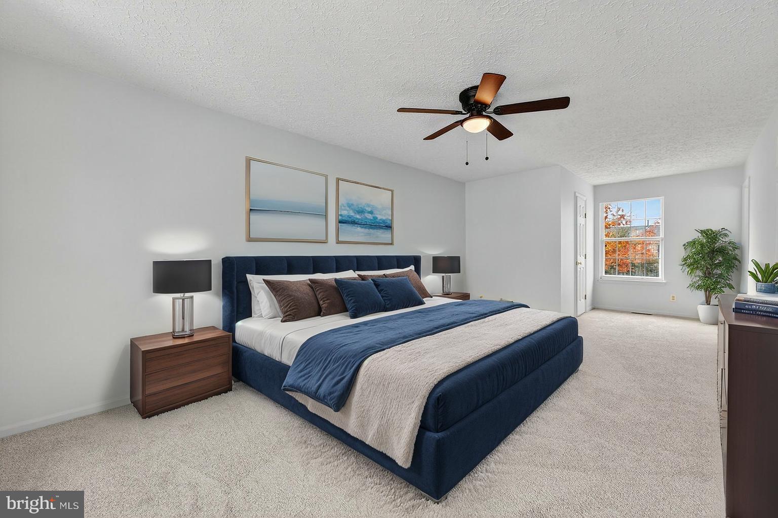 212 Chinnick Avenue Hamilton, NJ 08619 - Photo 9 of 17 a spacious bedroom with a bed and ceiling fan