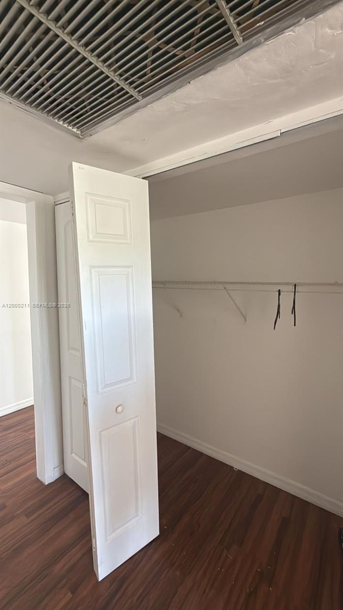 4222 Inverrary Boulevard, Unit 4215 Lauderhill, FL 33319 - Photo 14 of 20 a view of a hallway with wooden floor