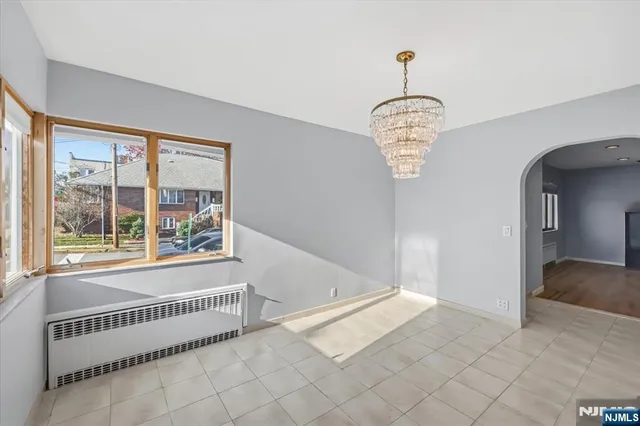 a view of a hallway view with staircase