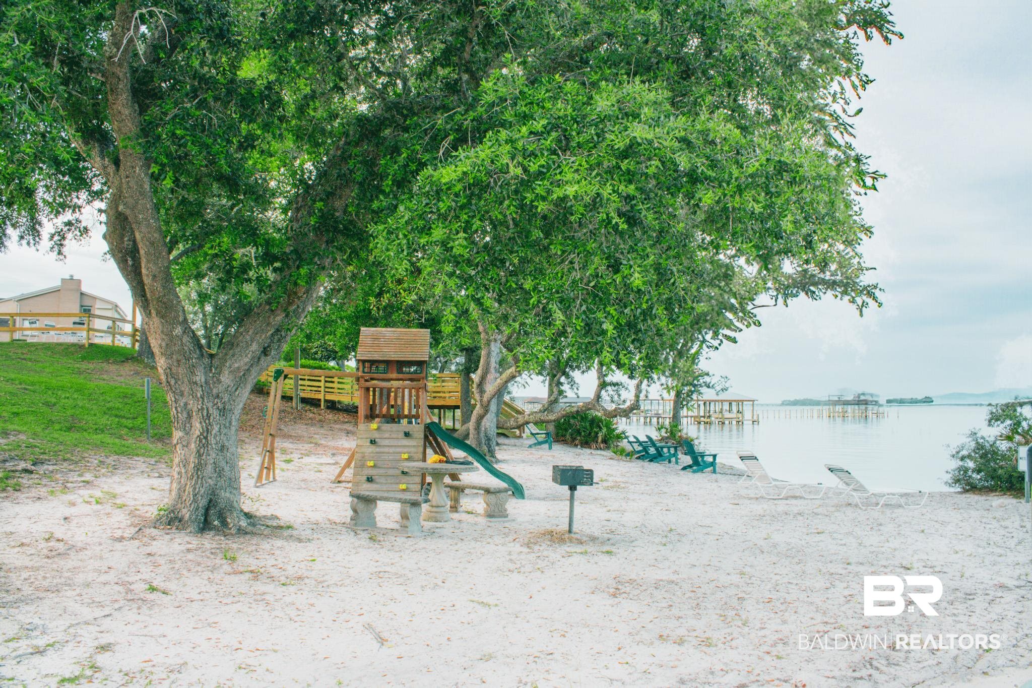 1563 Valencia Drive Lillian, AL 36549 - Photo 20 of 27 View of jungle gym featuring a water view