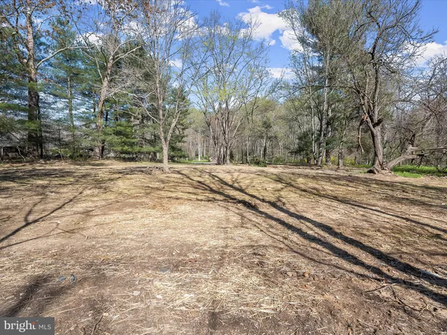 a view of a backyard of a house