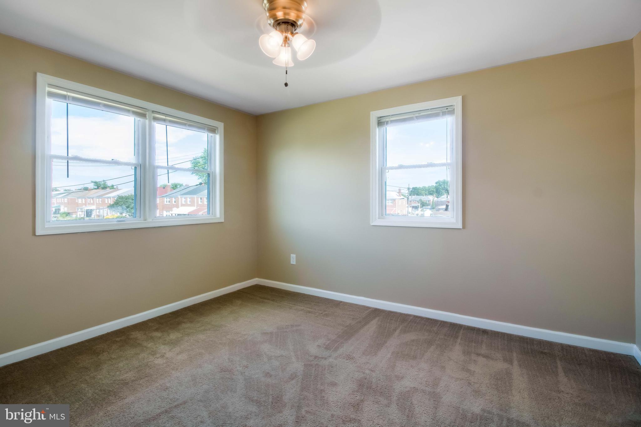 357 Grovethorn Road Baltimore, MD 21220 - Photo 14 of 34 a view of an empty room with a window