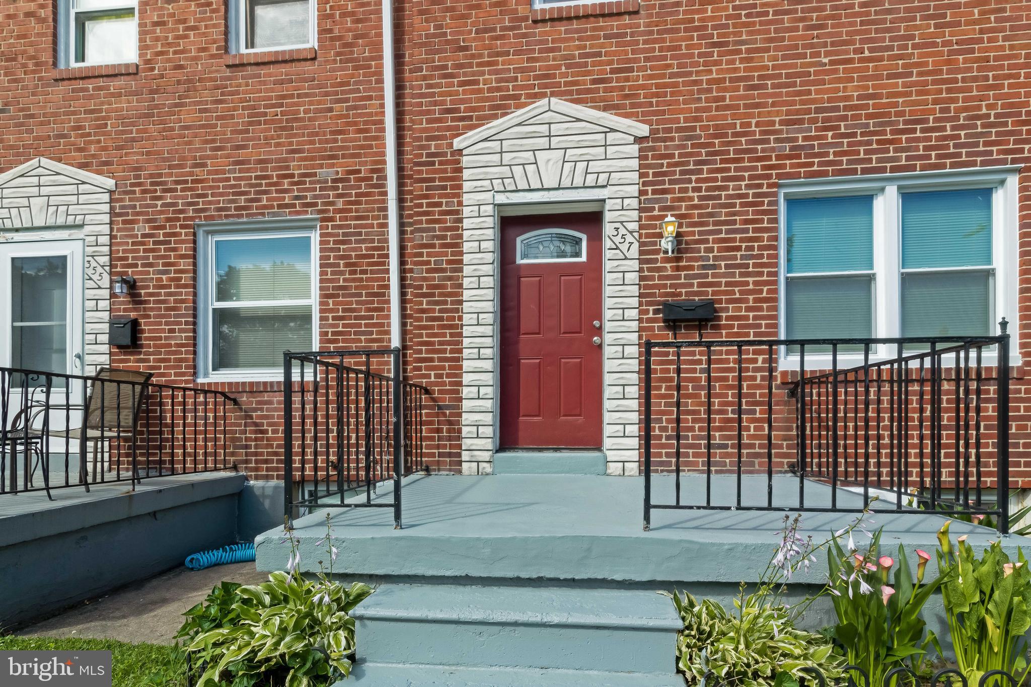 357 Grovethorn Road Baltimore, MD 21220 - Photo 3 of 34 a front view of a house with a garden
