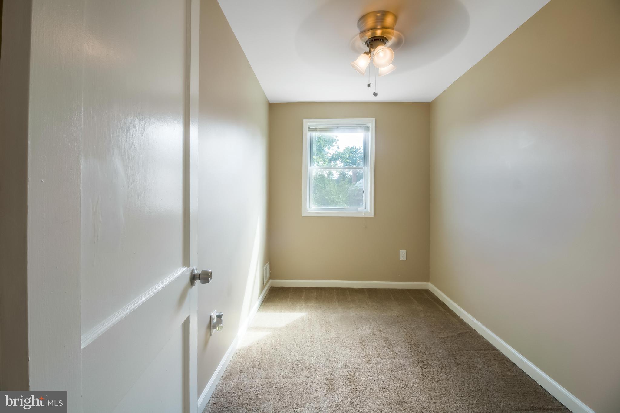 357 Grovethorn Road Baltimore, MD 21220 - Photo 22 of 34 a view of an empty room with a window