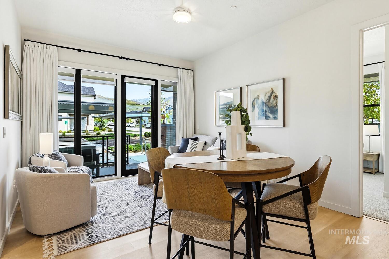 4250 Haystack, Unit 104 Boise, ID 83716 - Photo 11 of 49 Dining space with plenty of natural light and light wood-style floors