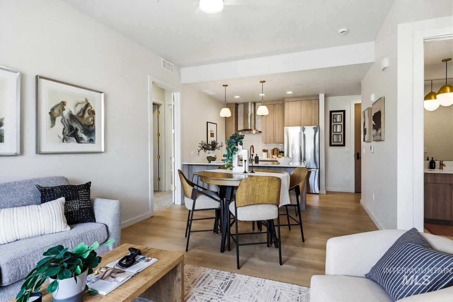 4250 Haystack, Unit 104 Boise, ID 83716 - Photo 12 of 49 Dining room featuring light wood-type flooring and recessed lighting