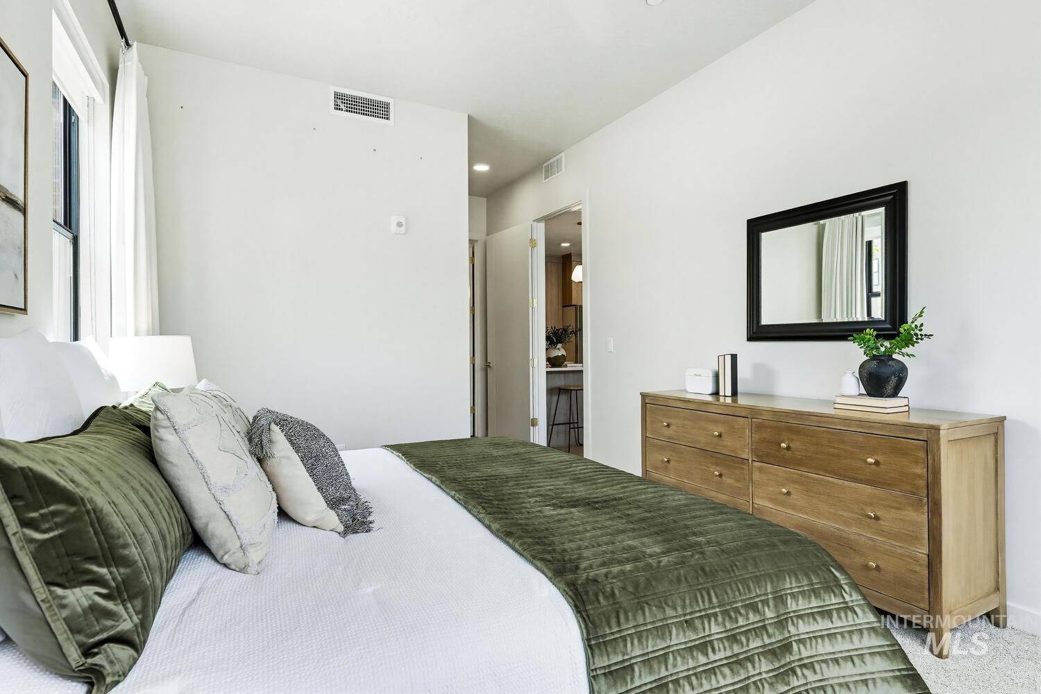 4250 Haystack, Unit 104 Boise, ID 83716 - Photo 14 of 49 Bedroom featuring carpet floors