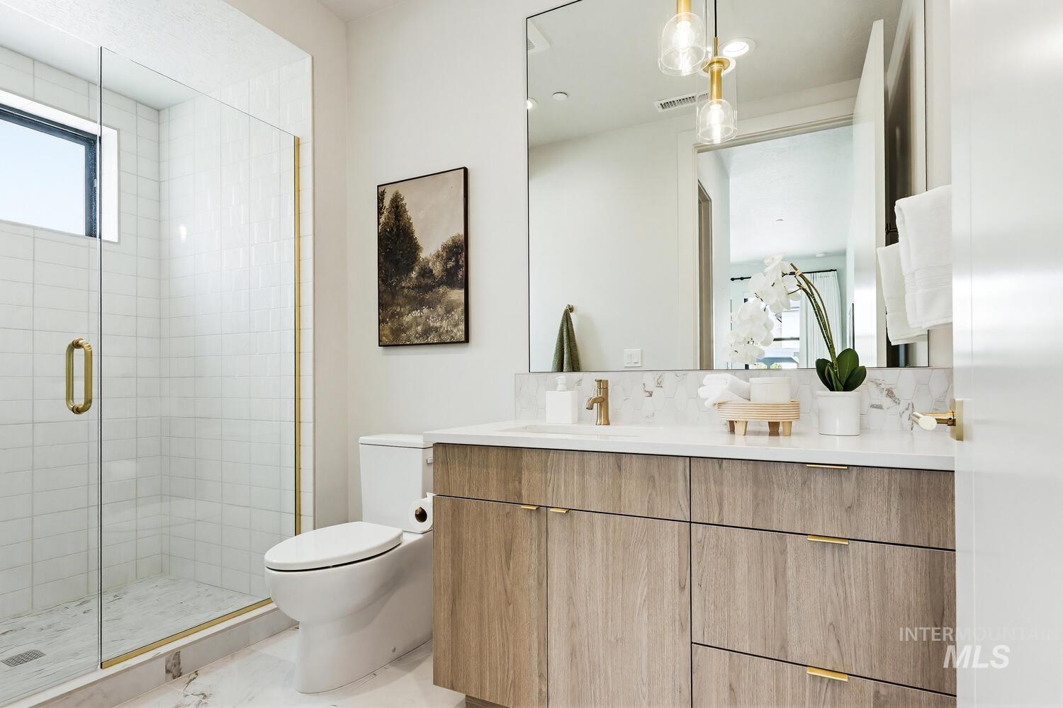 4250 Haystack, Unit 104 Boise, ID 83716 - Photo 19 of 49 Full bath featuring vanity and a stall shower