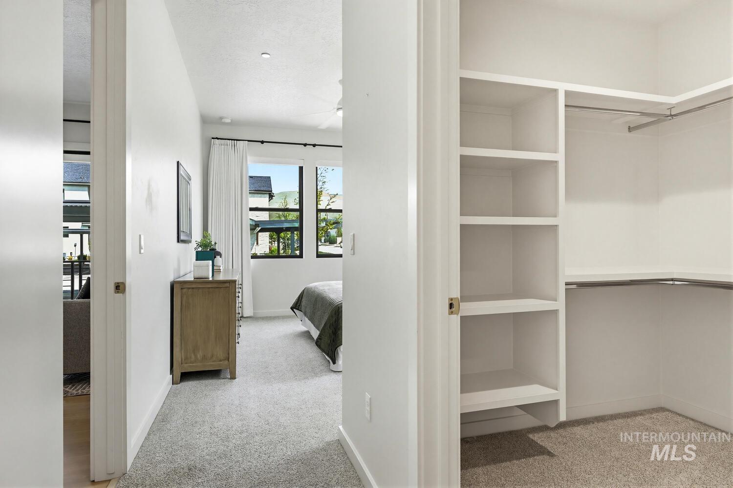 4250 Haystack, Unit 104 Boise, ID 83716 - Photo 21 of 49 Walk in closet featuring light colored carpet