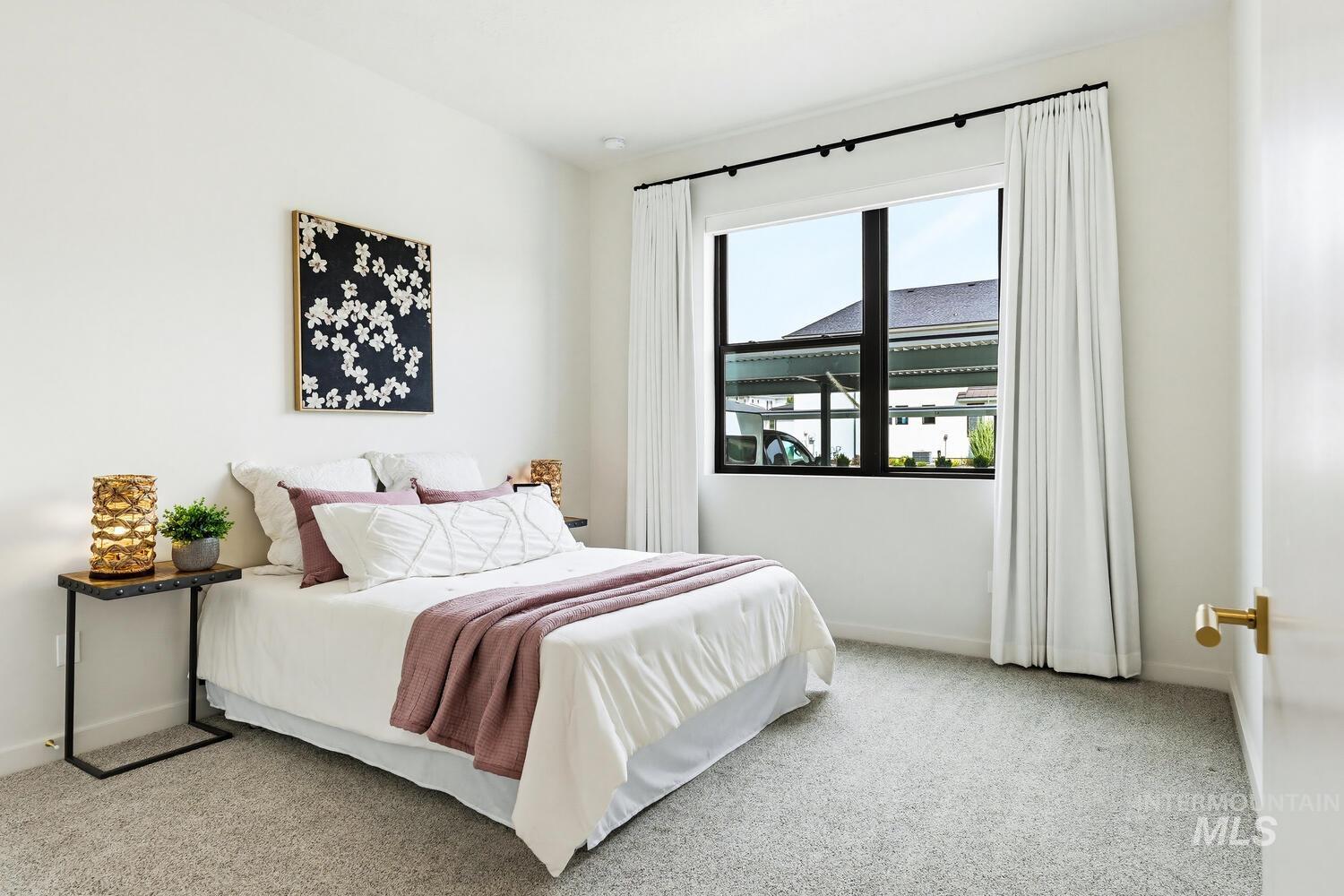 4250 Haystack, Unit 104 Boise, ID 83716 - Photo 23 of 49 Bedroom featuring light colored carpet and baseboards