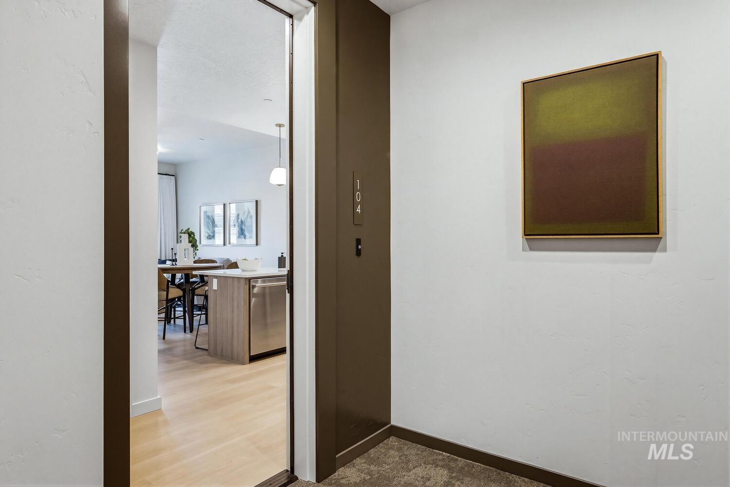 4250 Haystack, Unit 104 Boise, ID 83716 - Photo 29 of 49 Hallway with baseboards