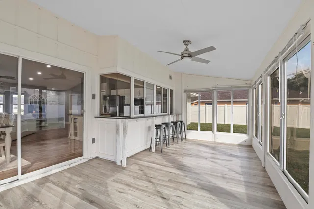 a view of livingroom with furniture wooden floor and window