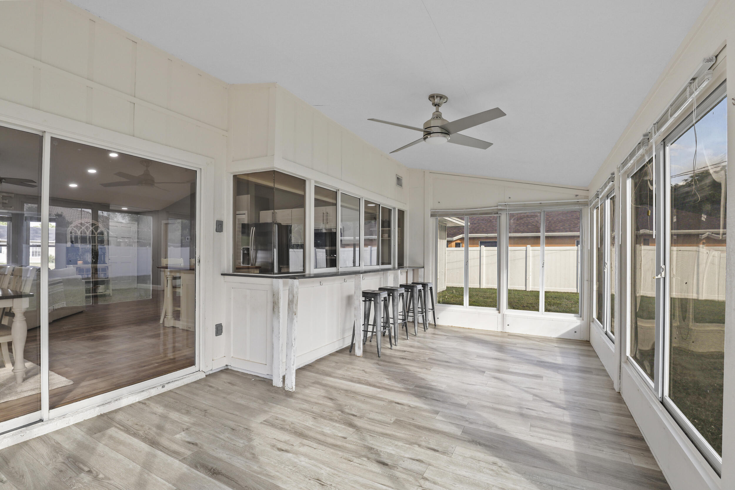 1542 Southwest Dycus Avenue Port St. Lucie, FL 34953 - Photo 27 of 34 a view of livingroom with furniture wooden floor and window
