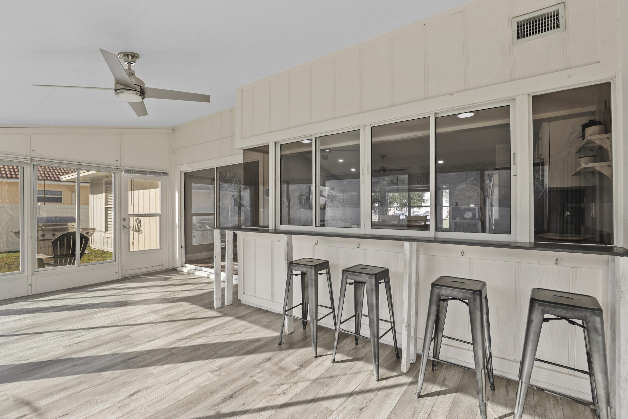1542 Southwest Dycus Avenue Port St. Lucie, FL 34953 - Photo 28 of 34 a view of a living room and entryway