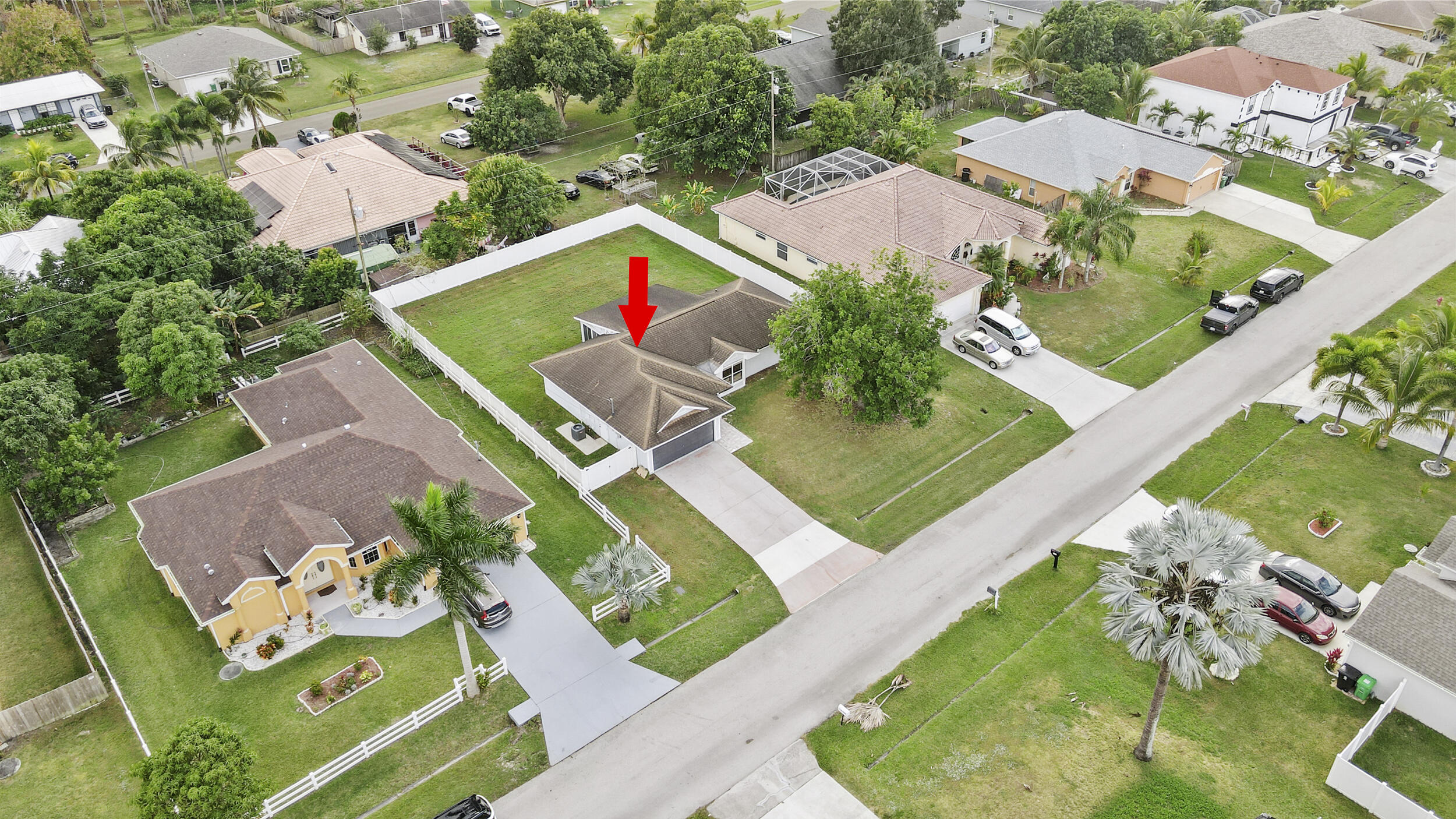 1542 Southwest Dycus Avenue Port St. Lucie, FL 34953 - Photo 33 of 34 an aerial view of a house