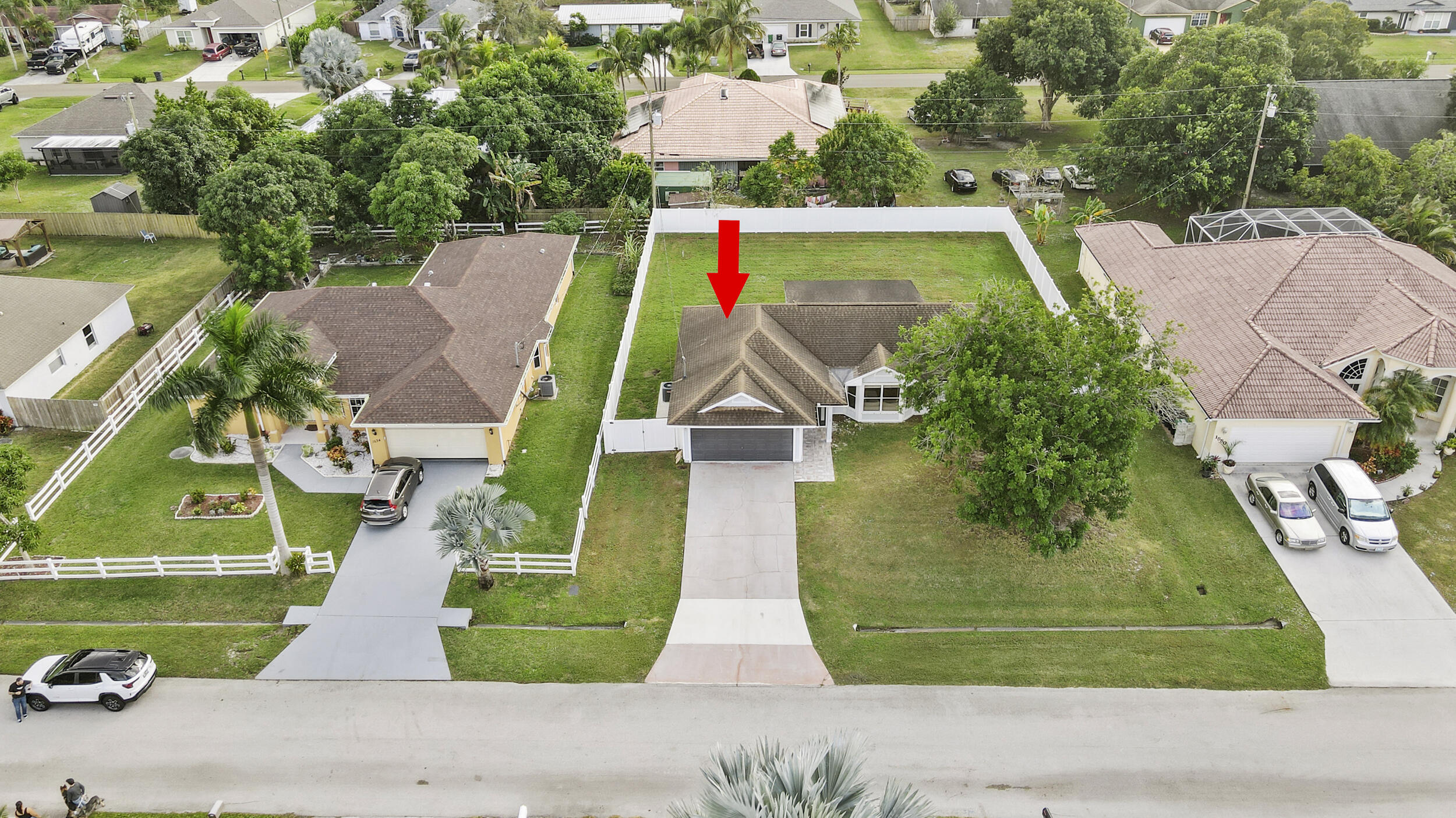 1542 Southwest Dycus Avenue Port St. Lucie, FL 34953 - Photo 34 of 34 an aerial view of a house
