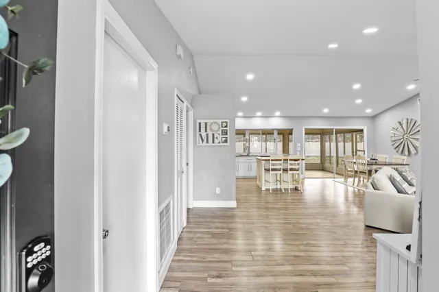 a lobby with furniture and a table