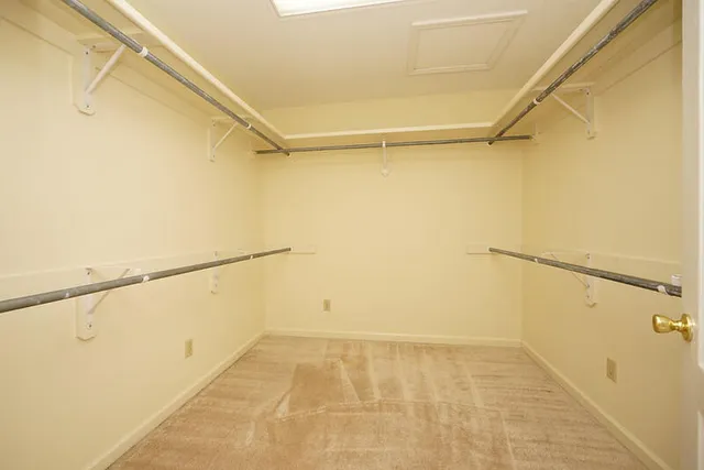 a view of a room with a wardrobe space