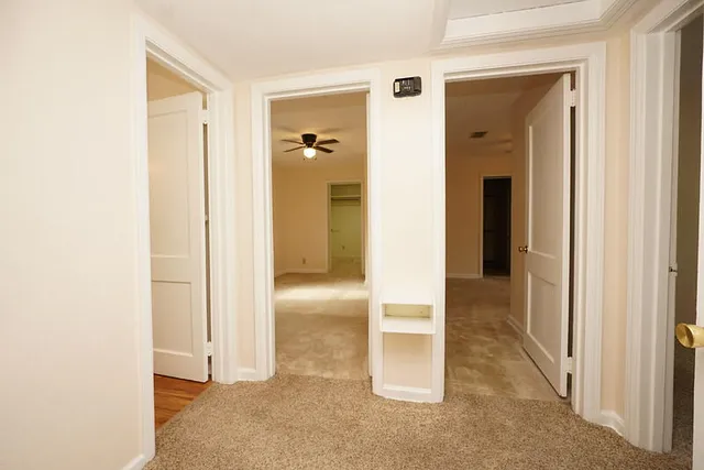 a backyard of a house with lots of green space