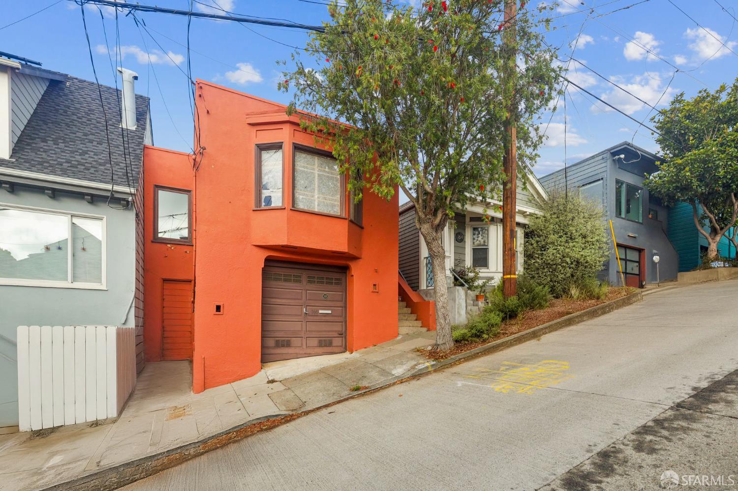 a front view of a house with a garage