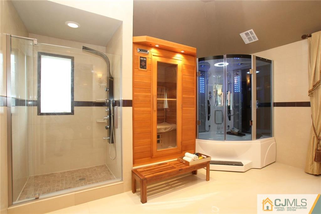 17 Richard Road Edison, NJ 08820 - Photo 17 of 25 a bathroom with a bathtub and a shower