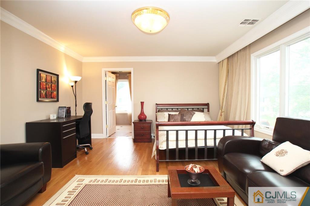 17 Richard Road Edison, NJ 08820 - Photo 19 of 25 a living room with furniture and a window