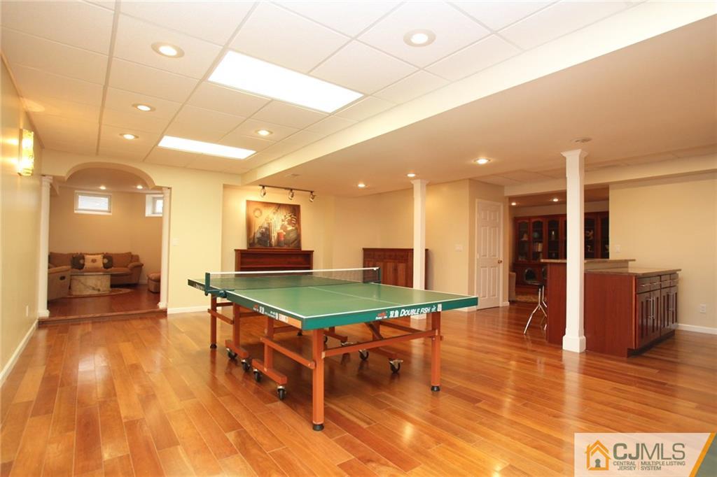 17 Richard Road Edison, NJ 08820 - Photo 23 of 25 a room with pool table and windows