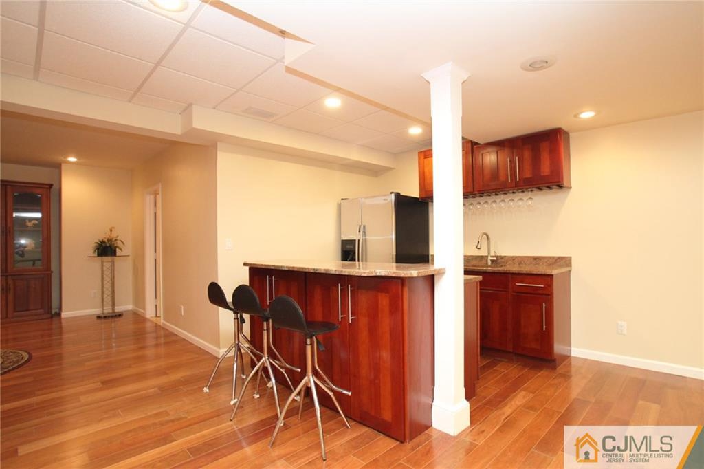 17 Richard Road Edison, NJ 08820 - Photo 24 of 25 a view of a hallway with seating area