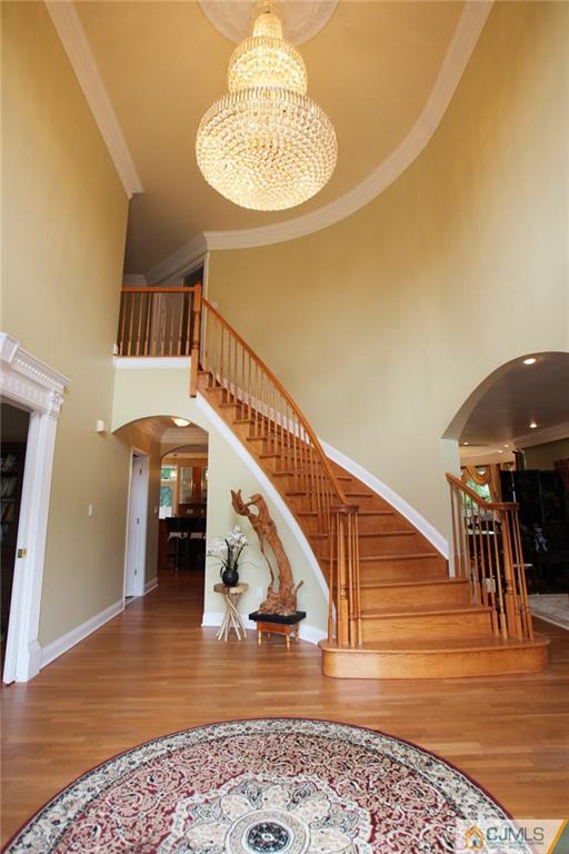 17 Richard Road Edison, NJ 08820 - Photo 7 of 25 a view of entryway and hall with wooden floor