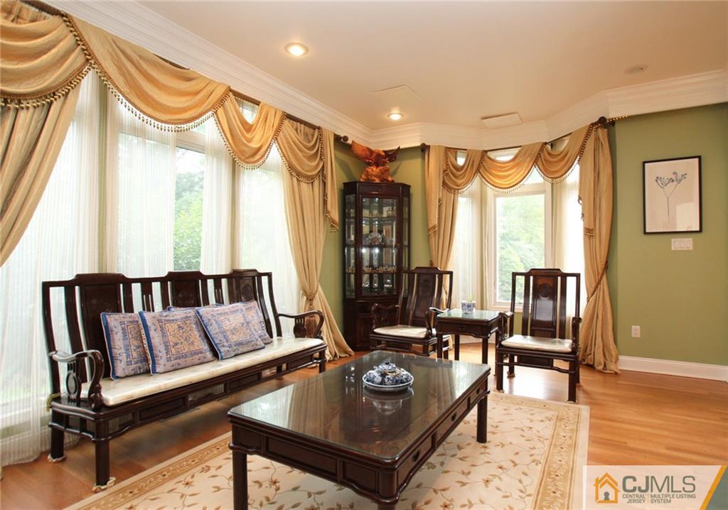 17 Richard Road Edison, NJ 08820 - Photo 8 of 25 a living room with furniture and large window