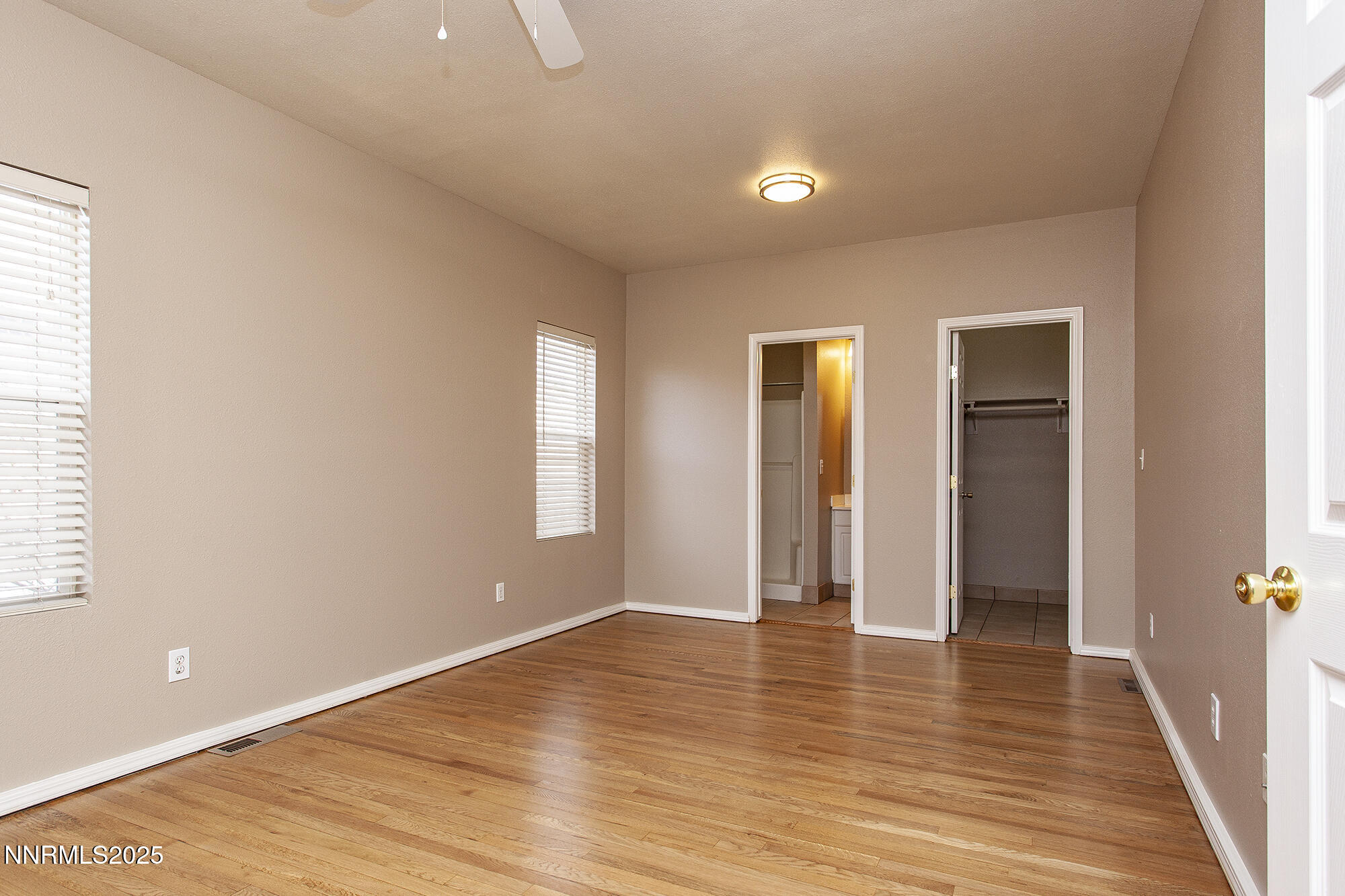 376 Wheeler Avenue Reno, NV 89502 - Photo 20 of 33 a view of an empty room with wooden floor